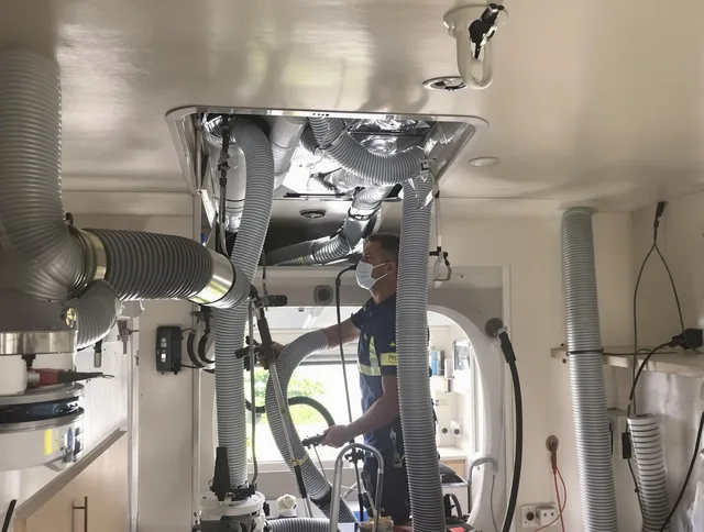 Carver Air Duct Cleaning specialist performing precise mobile home duct cleaning in Carver