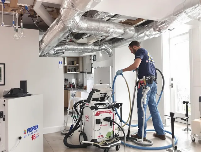 Carver Air Duct Cleaning technician performing advanced pure duct cleaning with specialized equipment in Carver